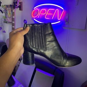 Black edgy scuffed boots.